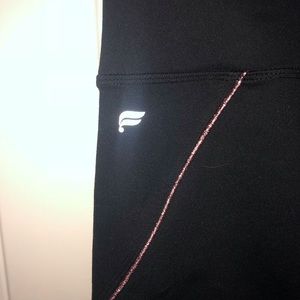 Black Fabletics leggings with pink detail